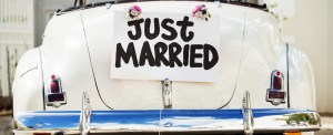 Just Married sign on the back of a vintage car